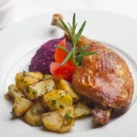 Crispy duck leg with braised champagne cabbage