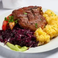 Roasted pork knuckle marinated in beer