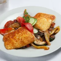 Grilled cheese on wok vegetables